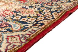 Close-up detail of 1990s Kerman rug from Iran / Persia showing Wool weave