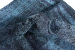 Surface texture of 1970s Khorasan rug with natural Wool and intricate pattern
