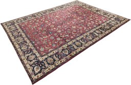 Corner detail of 1960s Mashad rug showing border pattern and Wool pile