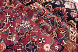 Close-up detail of 1960s Mashad rug from Iran / Persia showing Wool weave