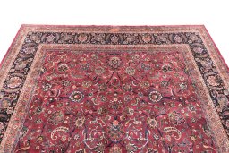 Surface texture of 1960s Mashad rug with natural Wool and intricate pattern