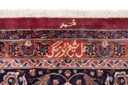 Central medallion detail of 1960s Mashad rug from Iran / Persia