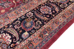 Full view of 1960s Mashad rug from Iran / Persia, 500 × 353 cm in Red tones