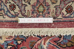 Full view of 1960s Mashad rug from Iran / Persia, 300 × 200 cm in Red tones