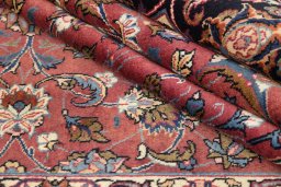 Close-up detail of 1960s Mashad rug from Iran / Persia showing Wool weave