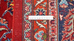 Full view of 1960s Mashad rug from Iran / Persia, 482 × 301 cm in Dark red tones
