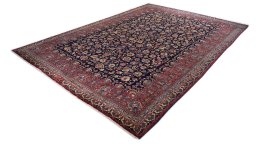 Corner detail of 1960s Mashad rug showing border pattern and Wool pile