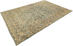 Corner detail of 1980s Mashad rug showing border pattern and Wool pile