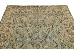 Surface texture of 1980s Mashad rug with natural Wool and intricate pattern