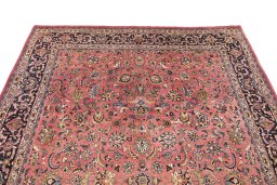 Surface texture of 1960s Mashad rug with natural Wool and intricate pattern
