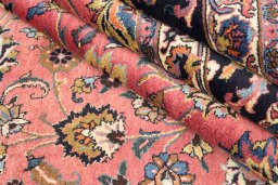 Close-up detail of 1960s Mashad rug from Iran / Persia showing Wool weave