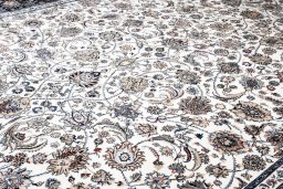 Corner detail of New Mashad rug showing border pattern and Wool pile
