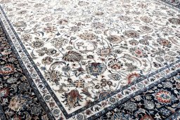 Close-up detail of New Mashad rug from Iran / Persia showing Wool weave