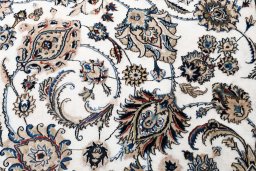 Central medallion detail of New Mashad rug from Iran / Persia