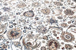 Close-up detail of New Mashad rug from Iran / Persia showing Wool weave