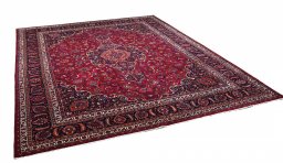 Corner detail of 1950s Mashad rug showing border pattern and Wool pile