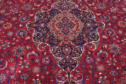 Central medallion detail of 1950s Mashad rug from Iran / Persia