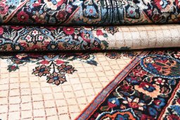 Close-up detail of 1950s Mashad rug from Iran / Persia showing Wool weave