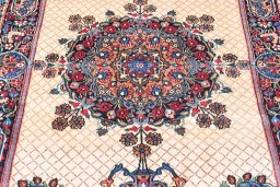 Central medallion detail of 1950s Mashad rug from Iran / Persia