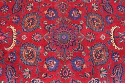 Central medallion detail of 1950s Mashad rug from Iran / Persia