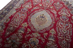Backside of handmade 1970s Mashad rug showing knot structure and weave density