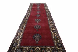 Surface texture of 1950s Mashad rug with natural Wool and intricate pattern