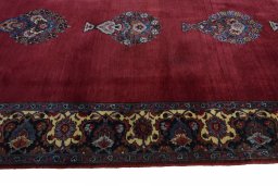 Full view of 1950s Mashad rug from Iran / Persia, 480 × 137 cm in Red tones
