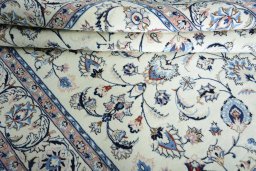Close-up detail of New Mashad rug from Iran / Persia showing Wool weave