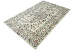 Corner detail of New Mashad rug showing border pattern and Wool pile
