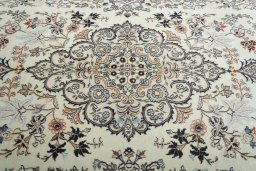 Central medallion detail of New Mashad rug from Iran / Persia