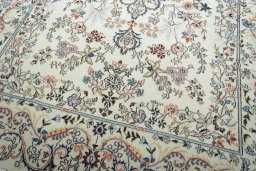 Close-up detail of New Mashad rug from Iran / Persia showing Wool weave