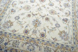 Close-up detail of New Mashad rug from Iran / Persia showing Wool weave