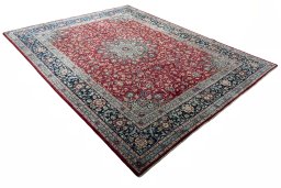 Close-up detail of 2000s Mashad rug from Iran / Persia showing Wool weave