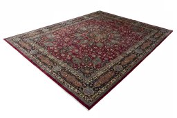 Corner detail of 2000s Mashad rug showing border pattern and Wool pile