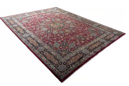 Close-up detail of 2000s Mashad rug from Iran / Persia showing Wool weave