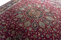 Backside of handmade 2000s Mashad rug showing knot structure and weave density