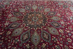 Central medallion detail of 2000s Mashad rug from Iran / Persia