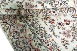Close-up detail of New Mashad rug from Iran / Persia showing Wool weave