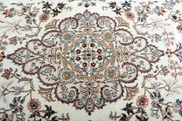 Central medallion detail of New Mashad rug from Iran / Persia