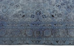 Corner detail of 1950s Mashad rug showing border pattern and Wool pile