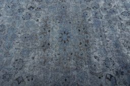 Central medallion detail of 1950s Mashad rug from Iran / Persia