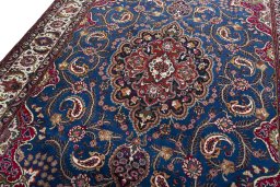 Backside of handmade 2000s Mashad rug showing knot structure and weave density