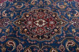 Central medallion detail of 2000s Mashad rug from Iran / Persia