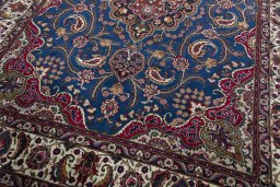 Close-up detail of 2000s Mashad rug from Iran / Persia showing Wool weave