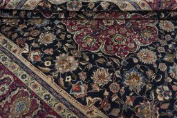 Close-up detail of 1970s Mashad rug from Iran / Persia showing Wool weave