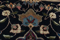 Central medallion detail of 1970s Mashad rug from Iran / Persia