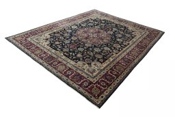 Corner detail of 1970s Mashad rug showing border pattern and Wool pile