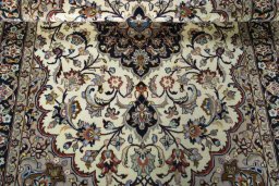Close-up detail of 2000s Mashad rug from Iran / Persia showing Wool weave