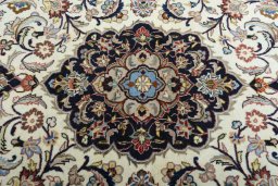 Central medallion detail of 2000s Mashad rug from Iran / Persia