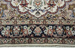 Full view of 2000s Mashad rug from Iran / Persia, 207 × 140 cm in Beige tones